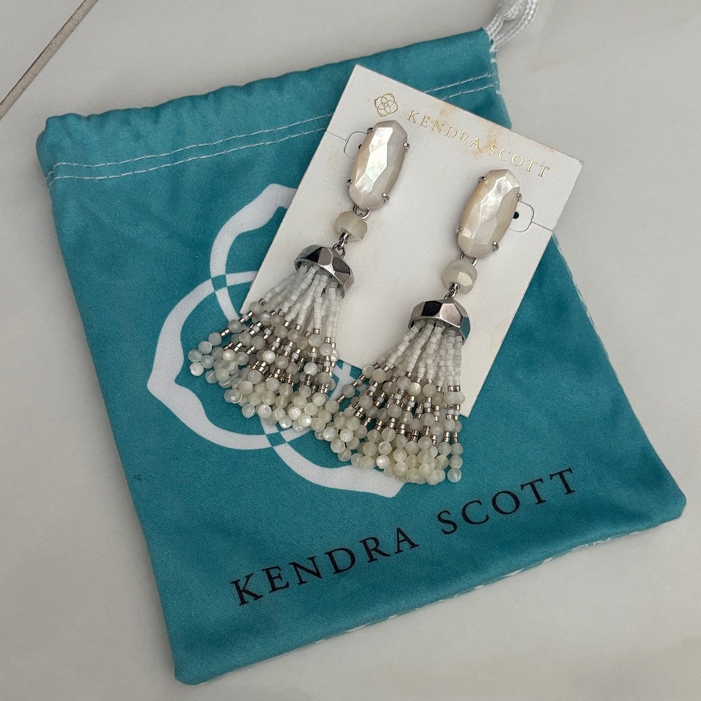 These Kendra Scott Dove Statement Earrings in Silver with stones